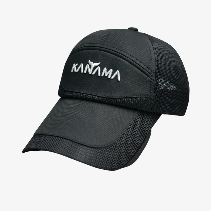 Black Kanama fishing cap featuring breathable mesh panels and adjustable design.