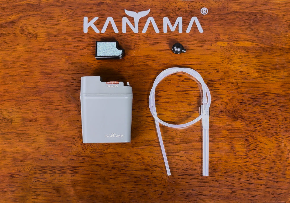 VersaPump electronic device with components on a wooden surface